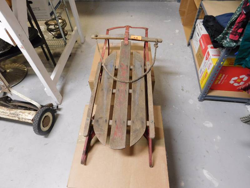 lot 18 image: Vintage wood and metal snow sled