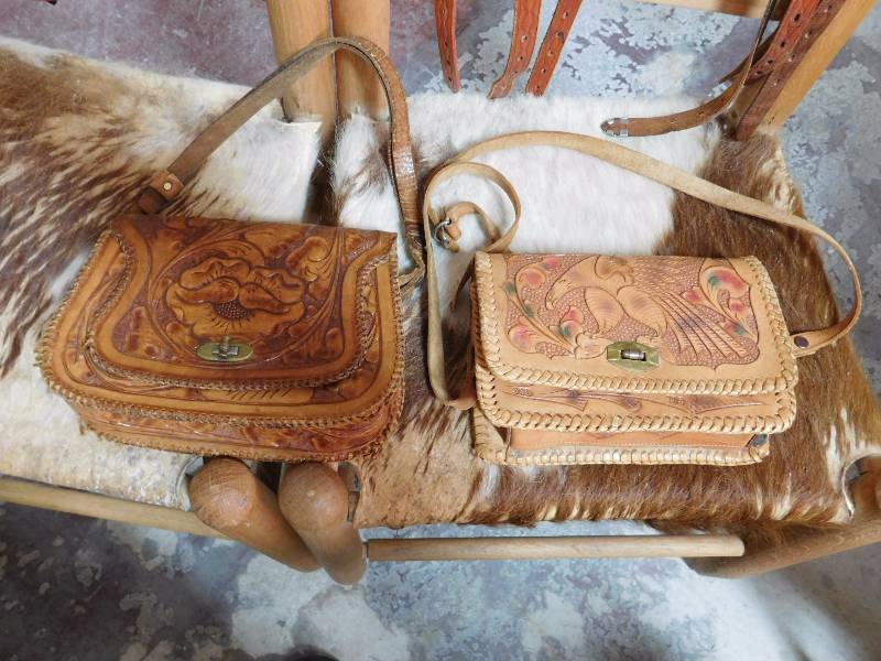 lot 134 image: two leather purses with nice leatherwork