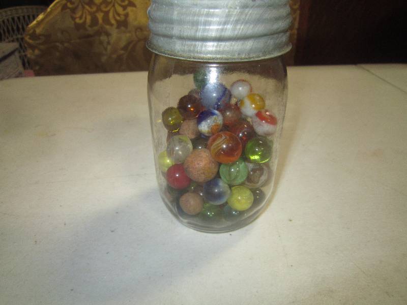 Jar of Marbles including Clay Marbles