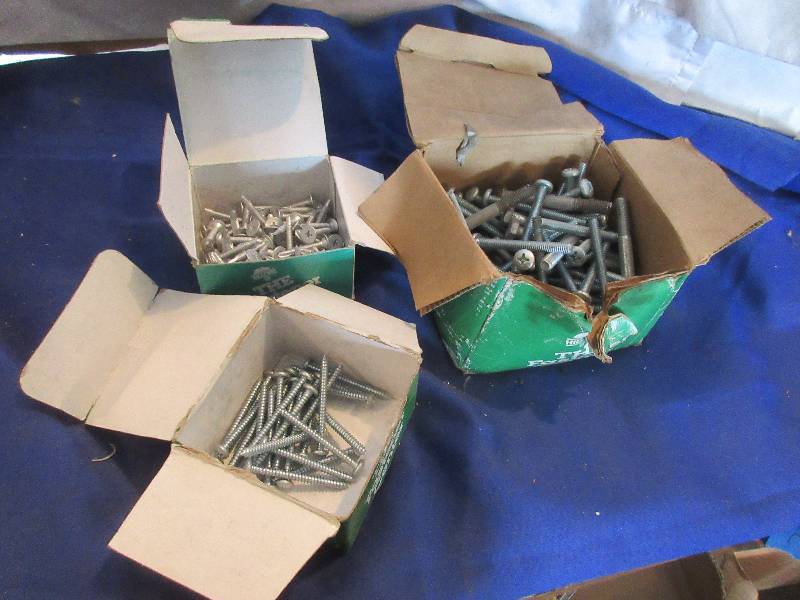 3 partial boxed screws and bolts