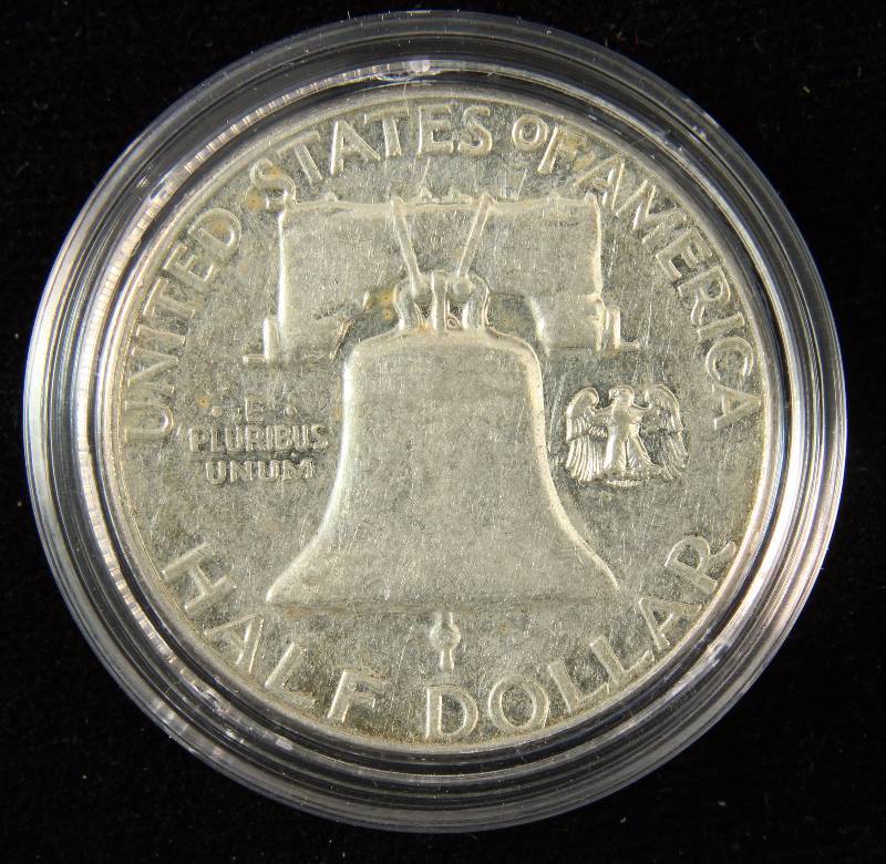 1957 FRANKLIN SILVER HALF DOLLAR IN AIRTITE HOLDER