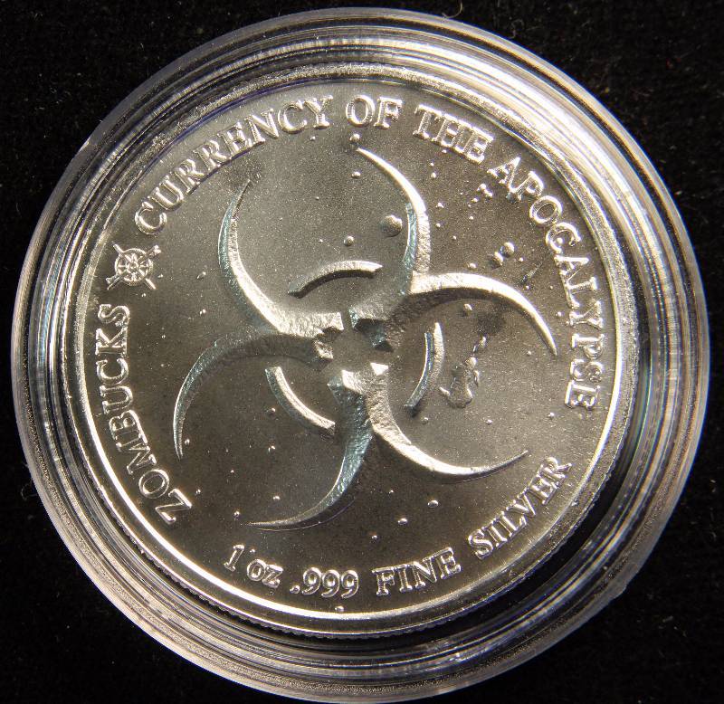 1 TROY OZ. .999 FINE SILVER ZOMBUCKS THE SAINT APOCALYPSE ROUND IN AIRTITE HOLDER