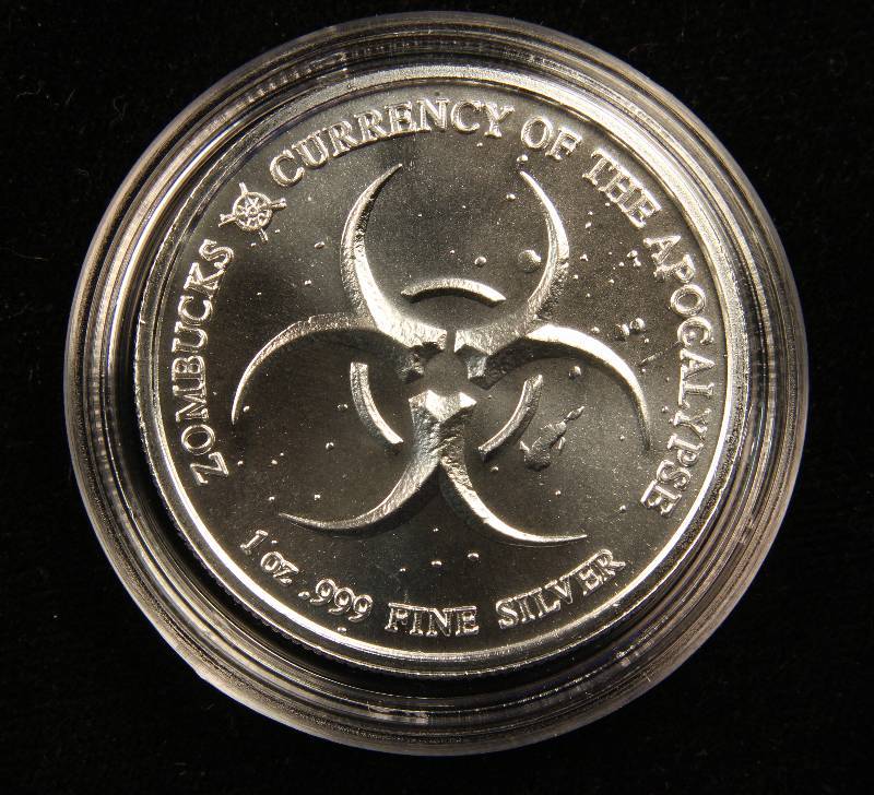 1 TROY OZ. .999 FINE SILVER ZOMBUCKS THE SAINT APOCALYPSE ROUND IN AIRTITE HOLDER