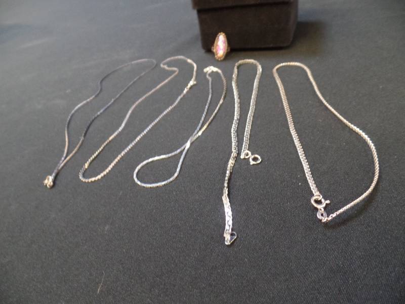 Variety of silver tone necklaces, ring