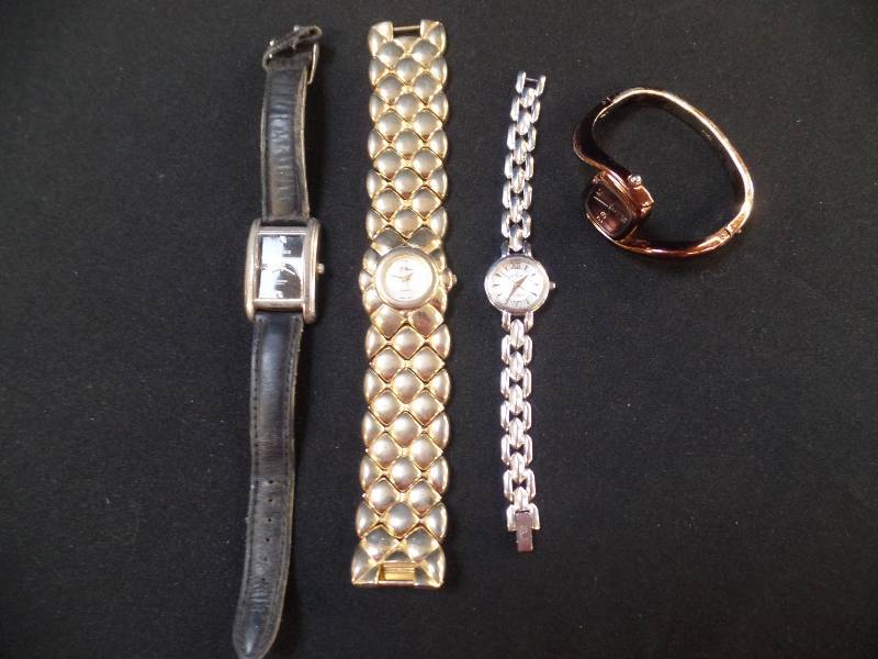 Four Wristwatches