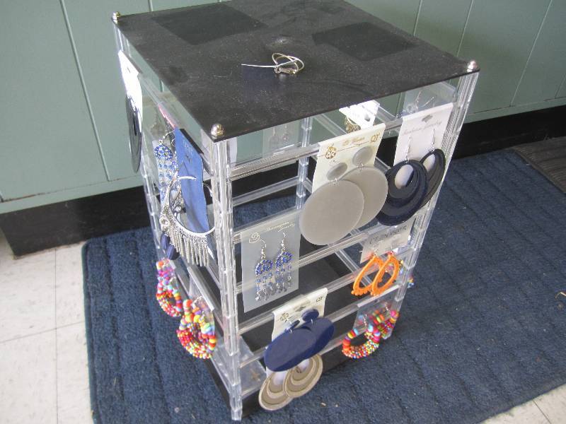 lot 56 image: Spinning jewelry display with jewel...