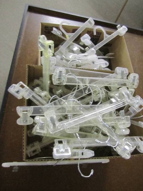 lot 409 image: Lot of pants clip hangers...