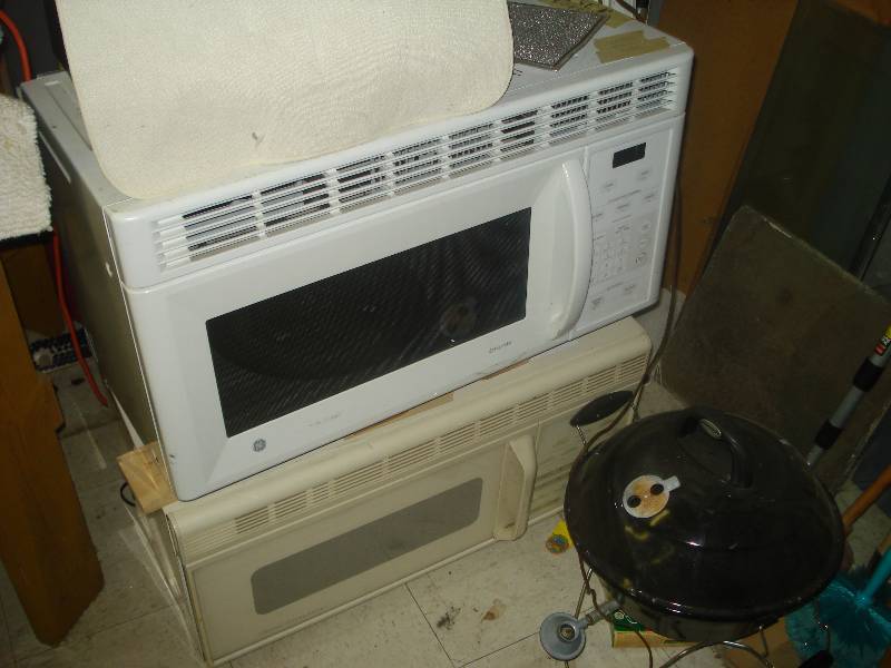 lot 601 image: 2 over the counter microwaves and a...