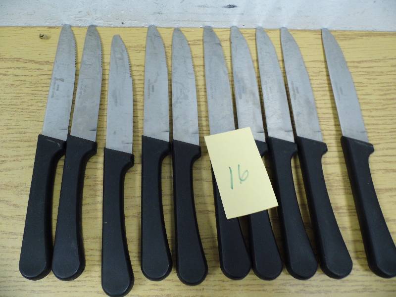 lot 16 image: 10 Black Handle Steak Knives