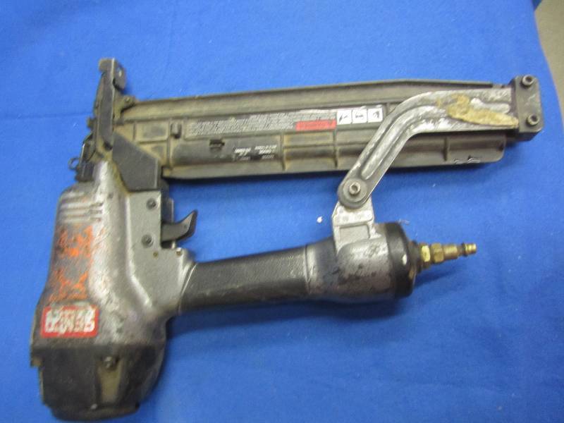 lot 28 image: Air powered staple gun...