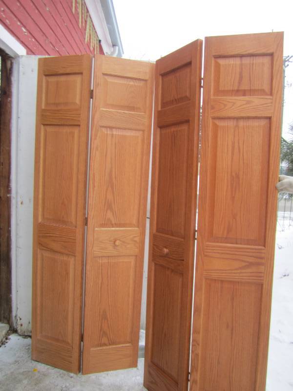 lot 8 image: 14 34 x 78 34 panels Bi fold door...