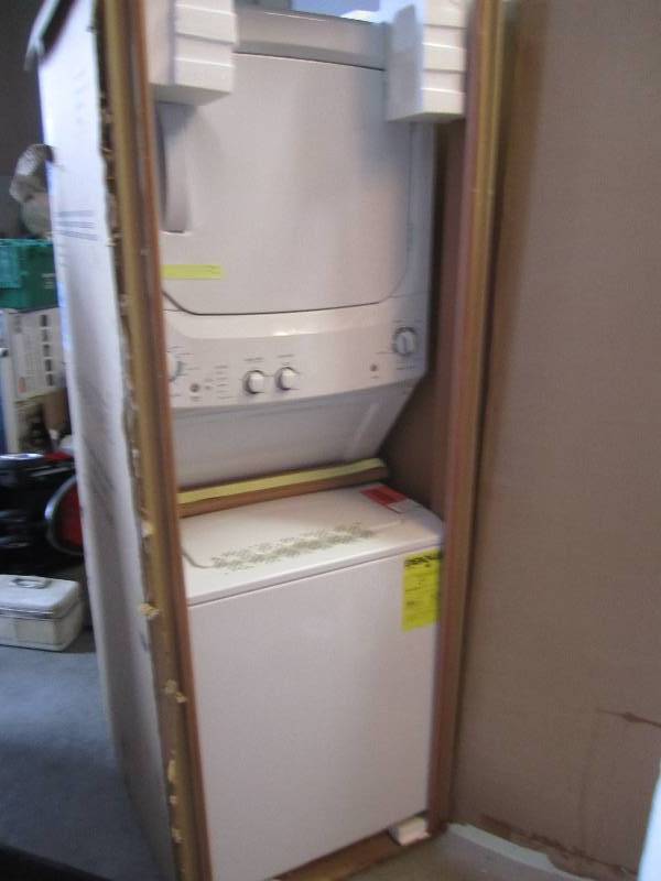 lot 71 image: Brand new Kenmore stacking washer a...