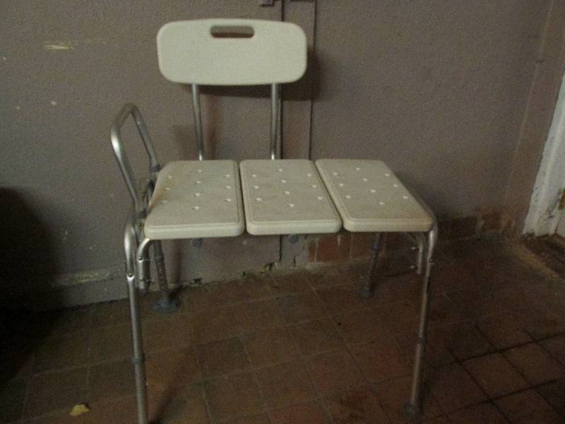 lot 97 image: foldable plastic chair with arm res...