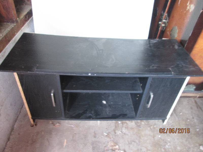 lot 107 image: TV stand 43 wide 21tall...