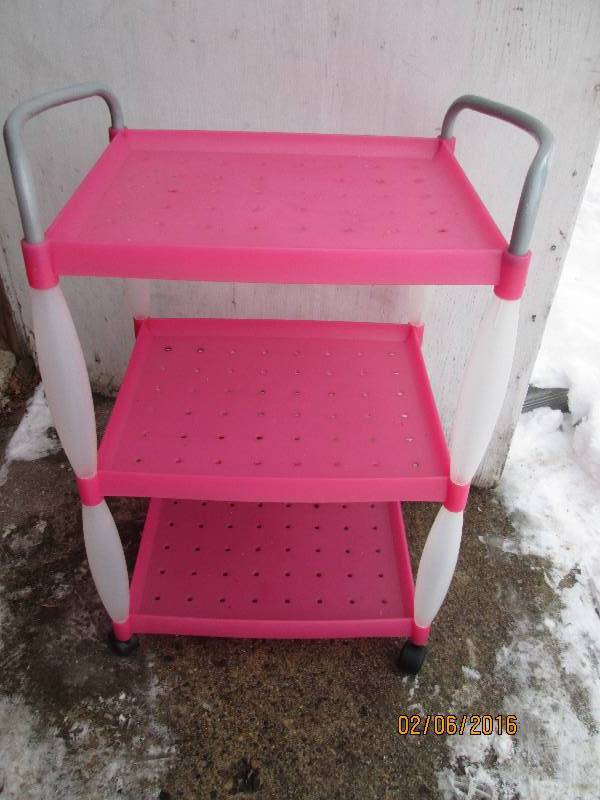 lot 115 image: pink cart with metal frame on wheel...