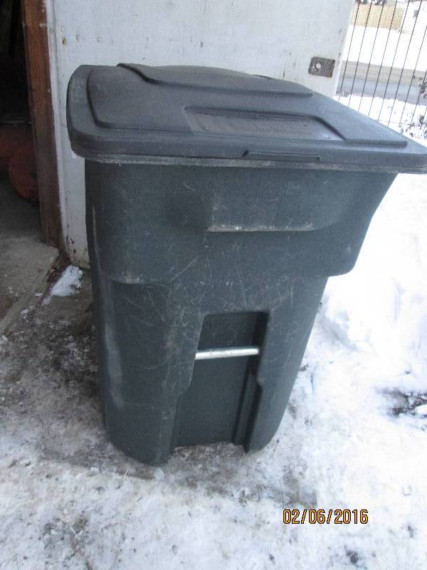lot 130 image: Brand new toter 96 gallon trash can...