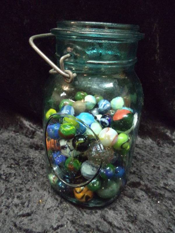 Misc Shooters & Marbles in Blue Glass Jar