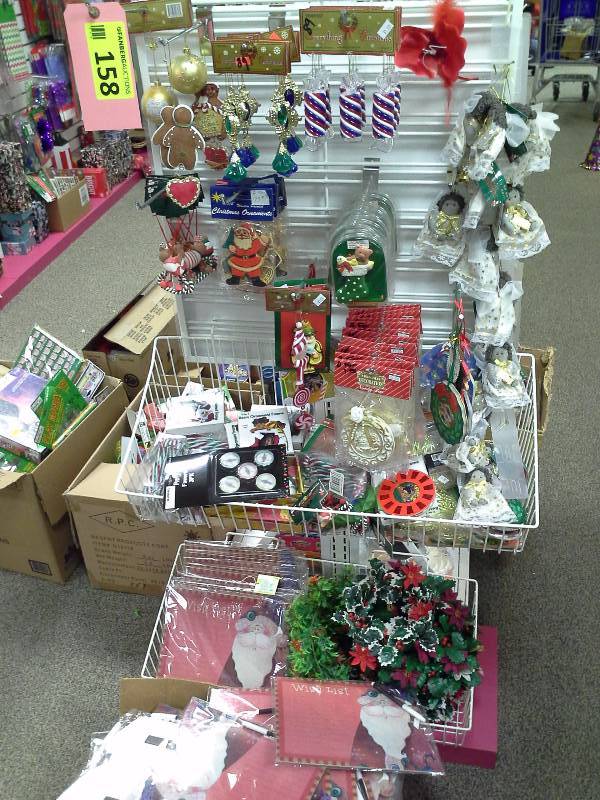 Endcap of Christmas related items, and Not included