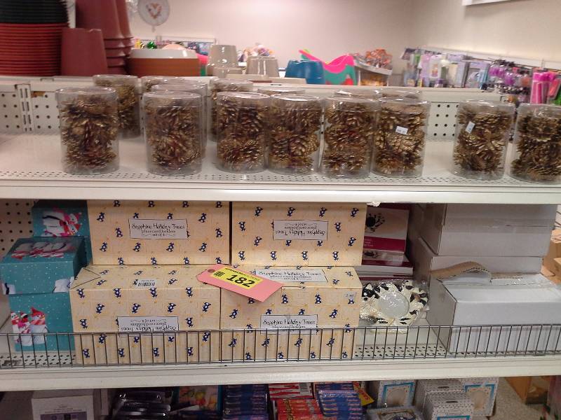 Two shelves of Christmas related accessories