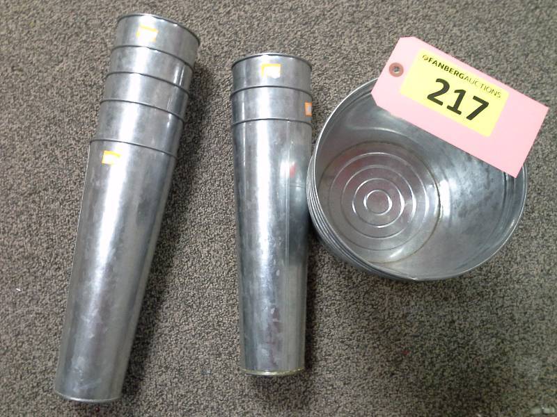 About 14 galvanized containers
