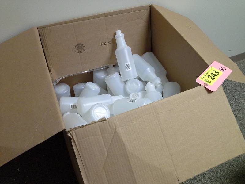 Large box of plastic bottles, no tops