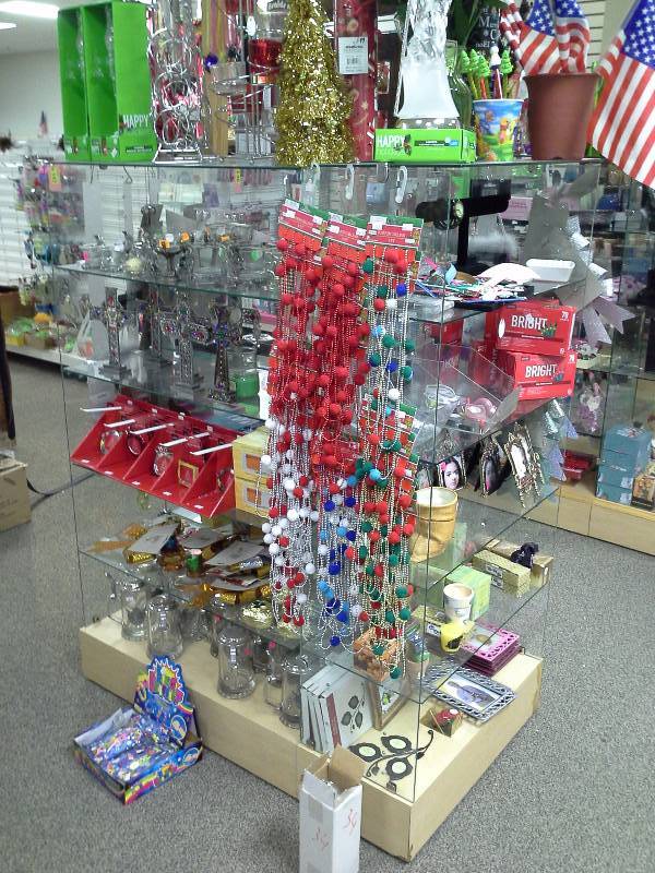 Glass display unit with contents