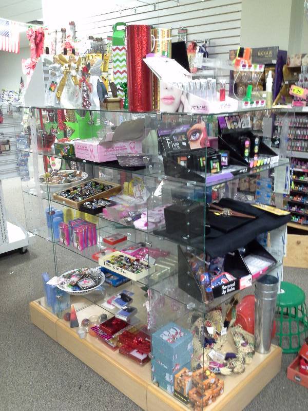 Glass display unit with contents