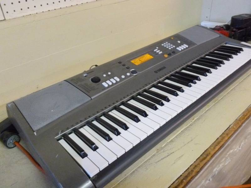 lot 27 image: Yamaha Keyboard