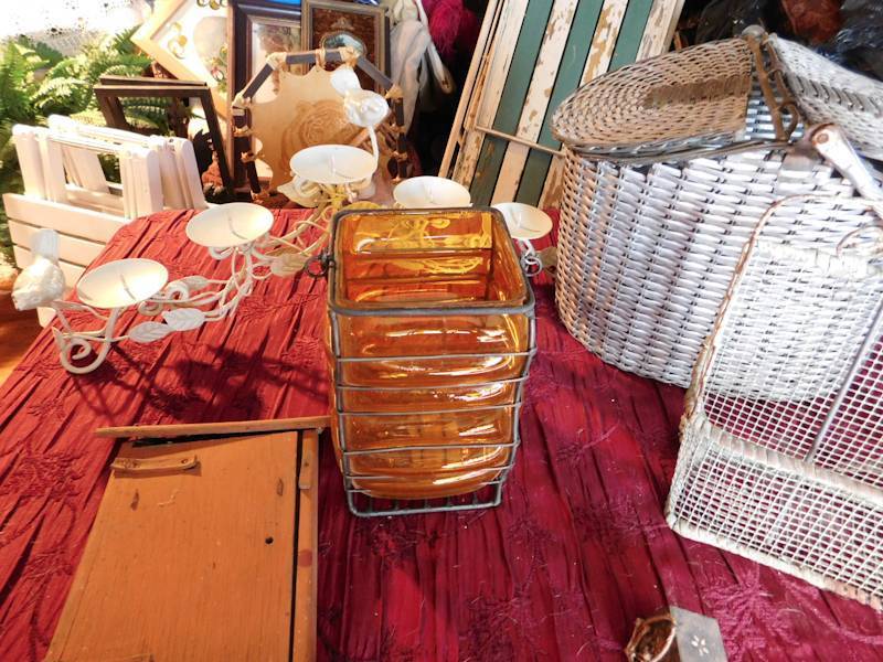 lot 131 image: lot of baskets a couple are metal, the largest one with two lids and handle is metal