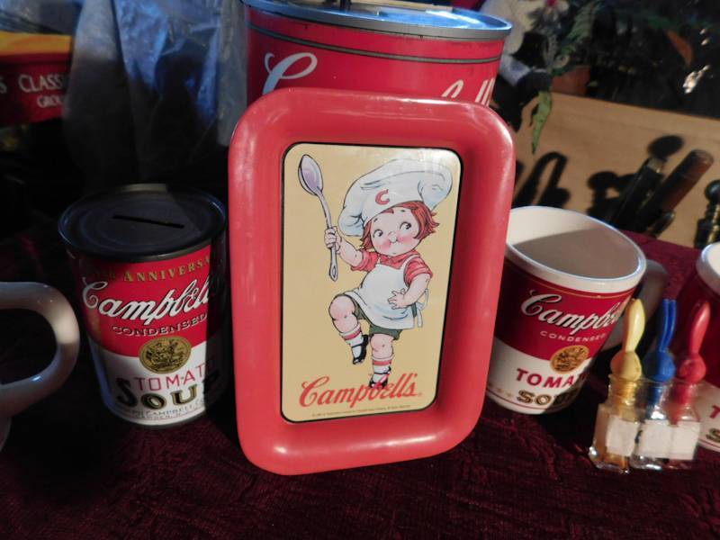 lot 64 image: Campbells soup lot Dazey Campbells soup can opener, mugs tin and more