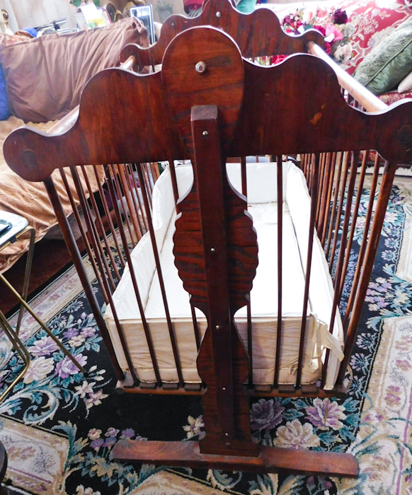 lot 14 image: ornate doll crib great for storing stuffed animals or dolls