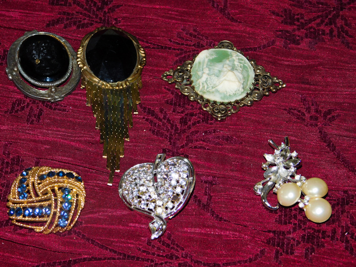 lot 37 image: interesting jewelry pieces pins and more
