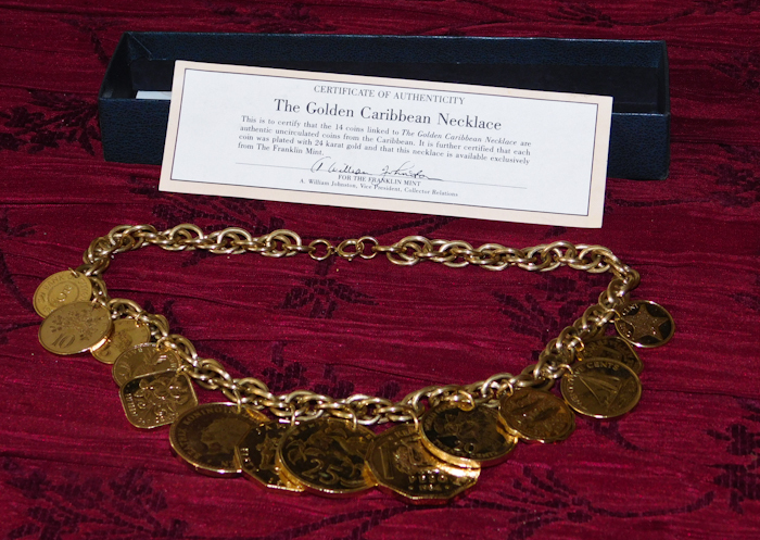 lot 54 image: The Golden Caribbean Necklace with COA