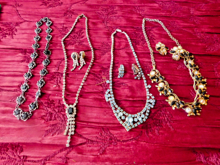 lot 55 image: 3 necklaces with matching earrings and a single necklace