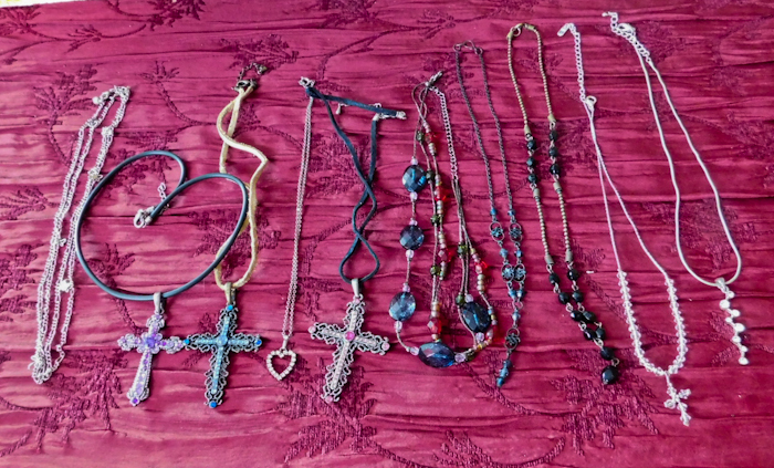 lot 66 image: several necklaces with hearts and crosses