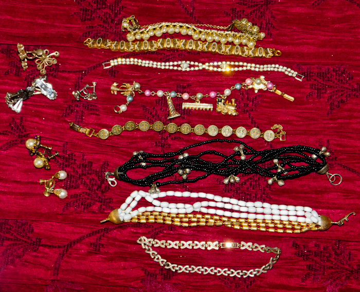 lot 93 image: 8 costume jewelry bracelets and 5 pair of earrings
