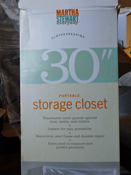 lot 153 image: NIB unused 30 storage closet on wheels Martha Stewart