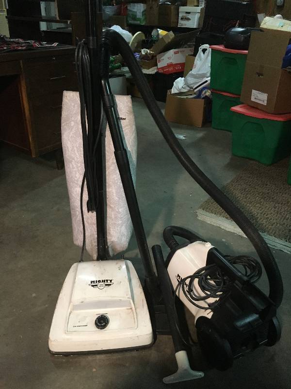 Two Vacuum Cleaners