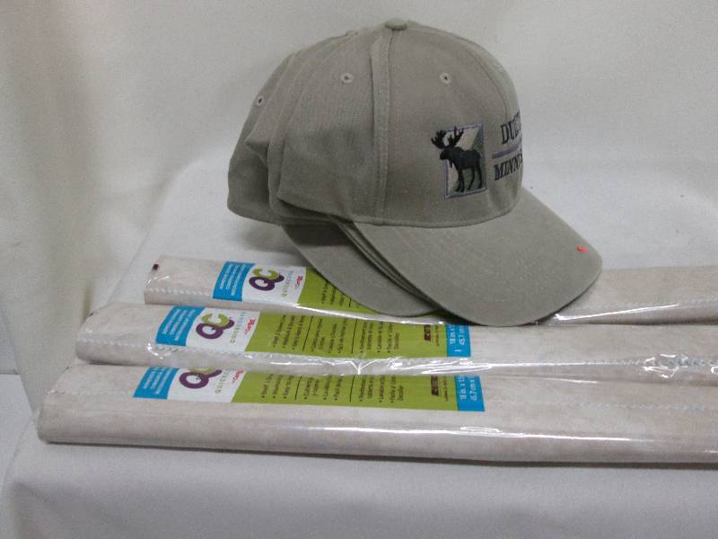 3 rolls shelf liner, 4 Duluth caps ...