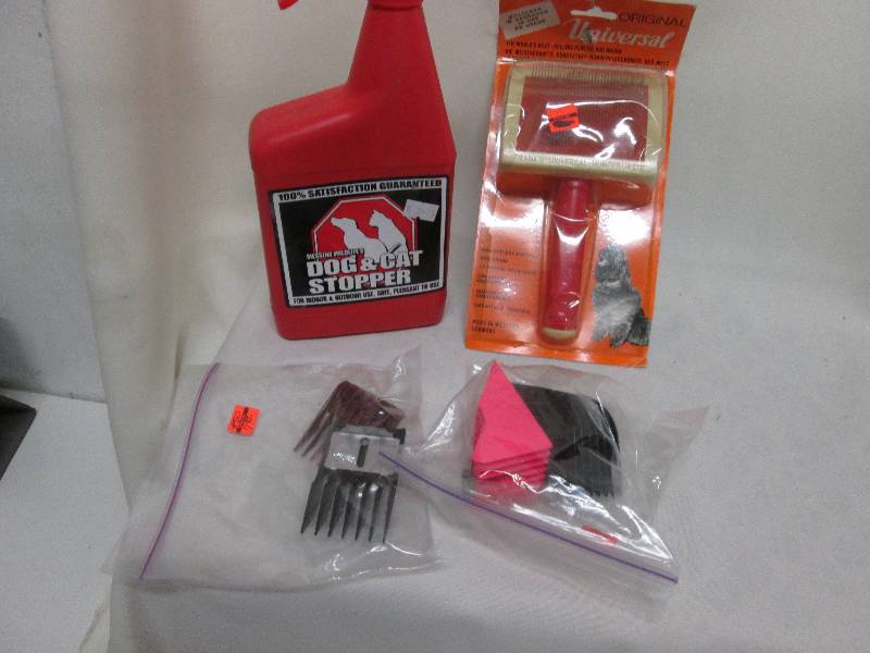 4 assorted groomer guards, dog brus...
