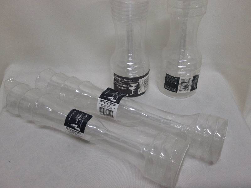 4 Pks of plastic champagne glasses ...