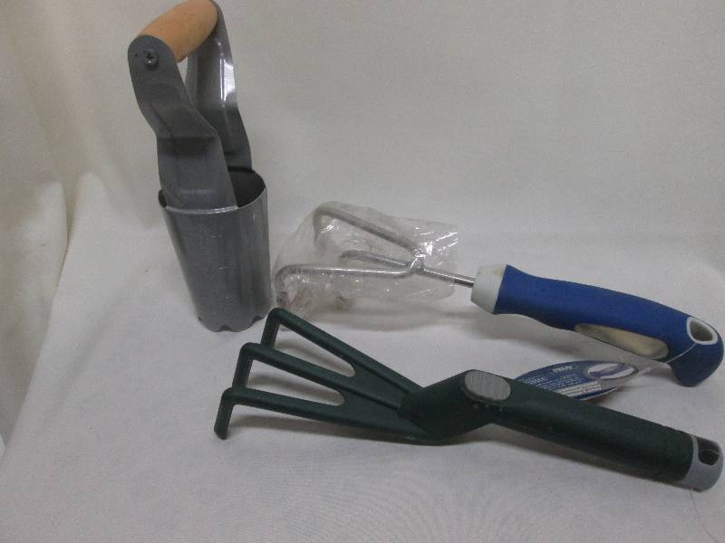2 garden cultivators & 1 bulb plant...