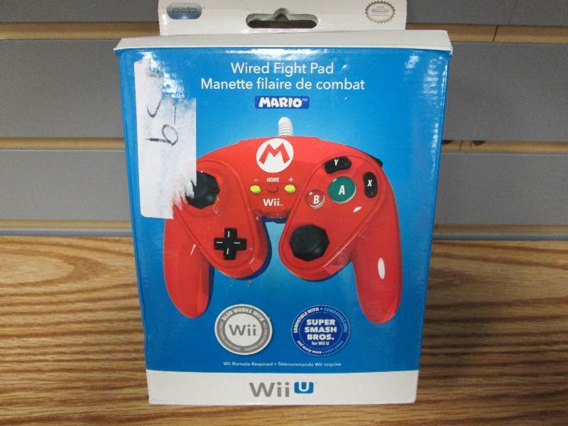 lot 16 image: Wii Wired Fight Pad...