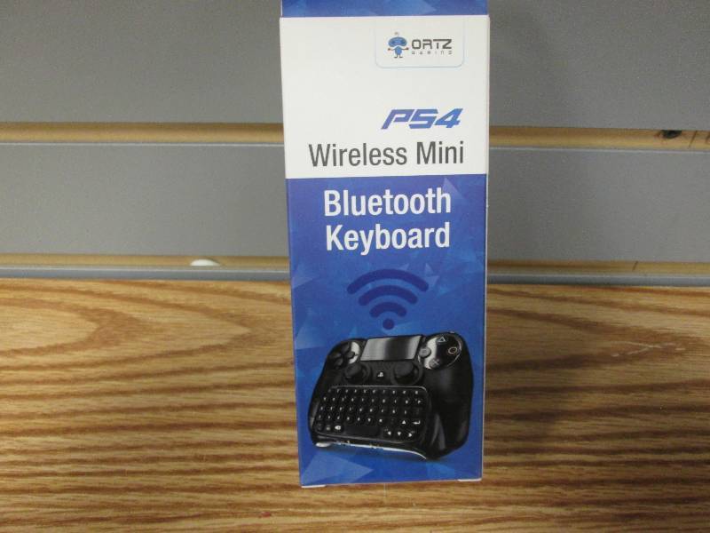 lot 21 image: PS4 Wireless Mini Bluetooth Keyboar...