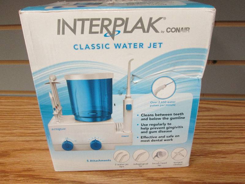 lot 23 image: Conair Interplak Classic Water Jet,...