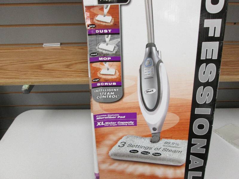 lot 151 image: Shark Pro Electric Steam Pocket Mop...
