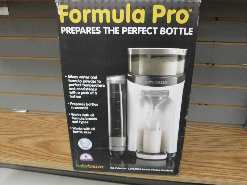 lot 214 image: Baby Breeza Formula Pro missing fun...