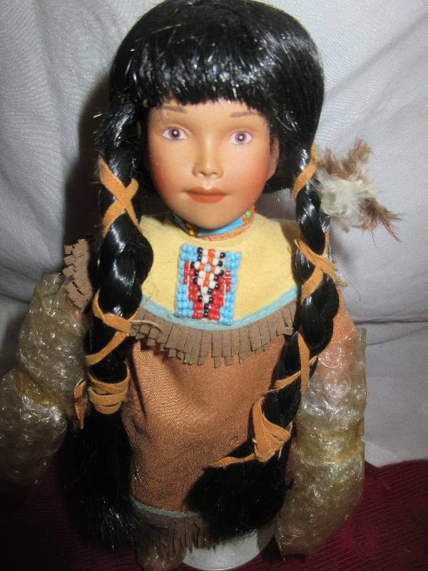 lot 90 image: PORILIAN INDIAN DOLL
