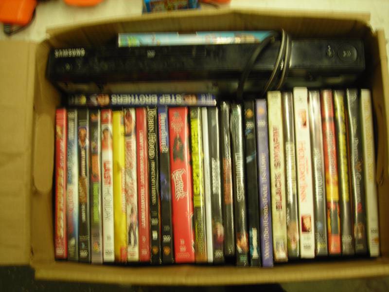DVD Player( Samsung), Assorted DVDs (28 Total)