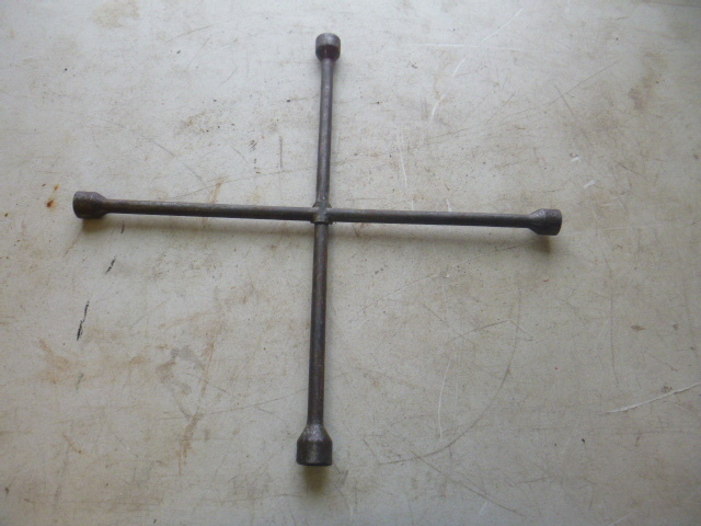lot 151 image: 4-Way tire wrench.